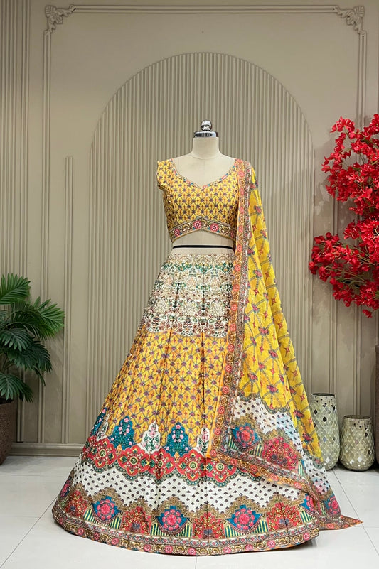 Mustard yellow printed lehenga set with floral border and diamante work, full front view on mannequin