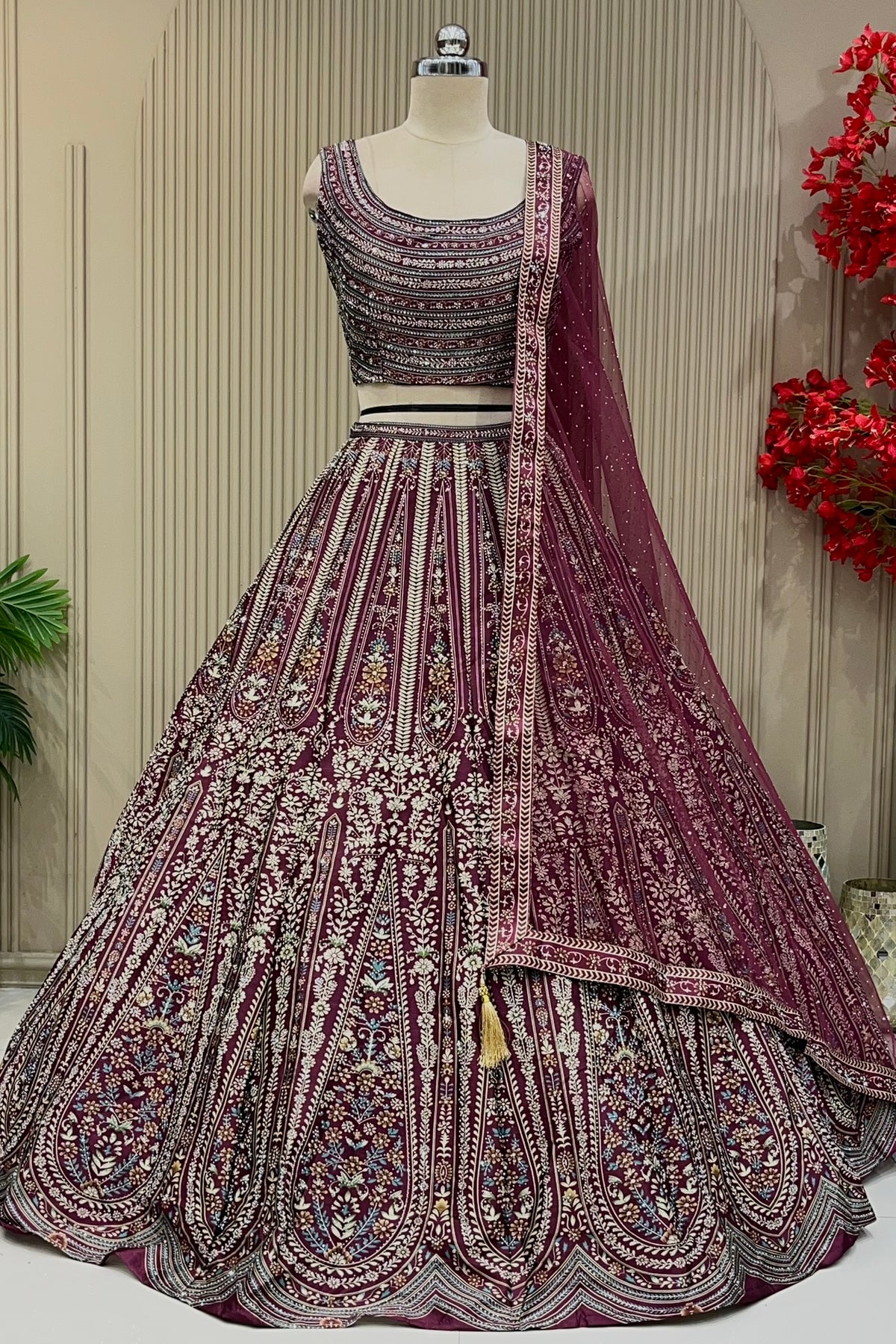 Wine printed lehenga set showing floral panel print across the skirt