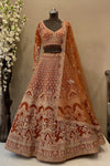 Rust Color Sangeet Lehenga with Traditional Embellishments | Festive Wedding Wear