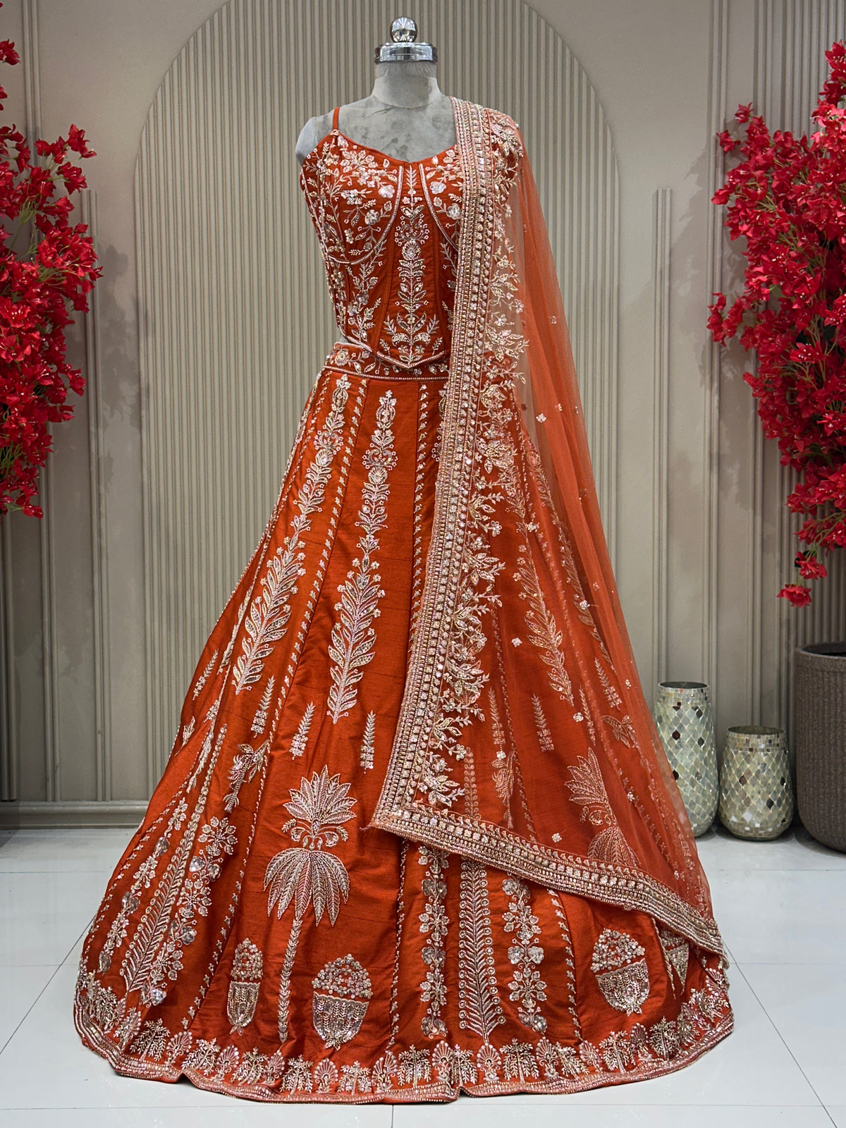 Full front view rust raw silk lehenga with beat work designer bridal wear at Urban Dulhaniya Pune