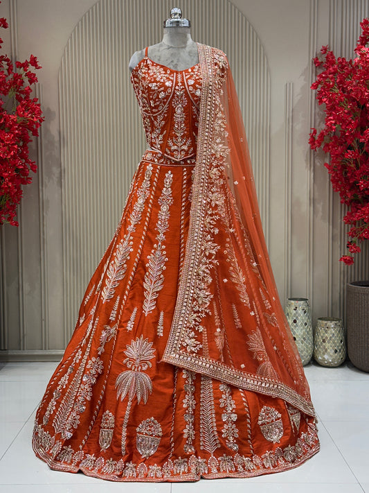 Full front view rust raw silk lehenga with beat work designer bridal wear at Urban Dulhaniya Pune