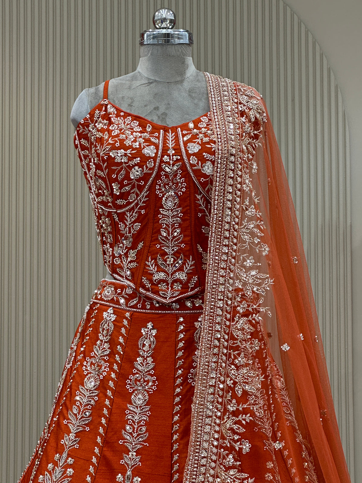 Upper body front view rust raw silk corset blouse with sequence work premium ethnic wear from Urban Dulhaniya