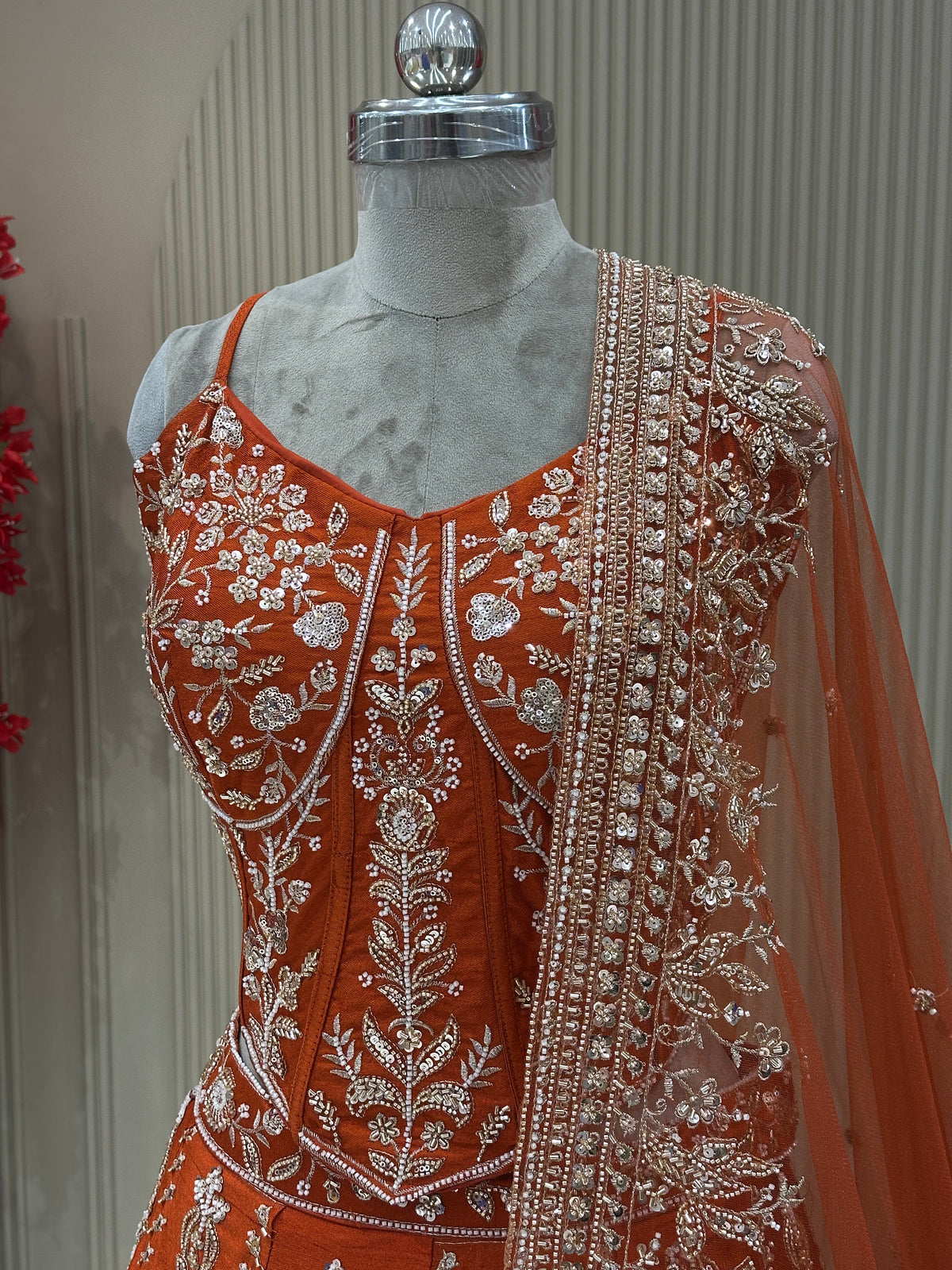 Front close-up view rust raw silk embellished corset blouse designer bridal wear at Urban Dulhaniya Pune