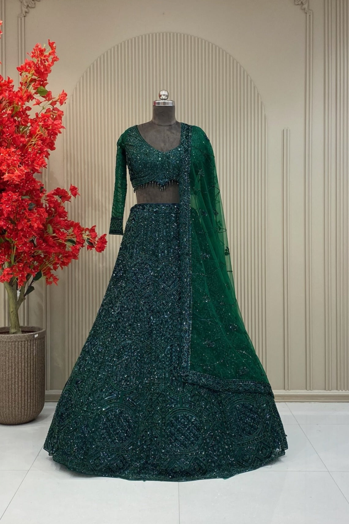 Emerald Green lehenga in heavy Beads work
