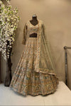 designer lehenga in pista green colour
