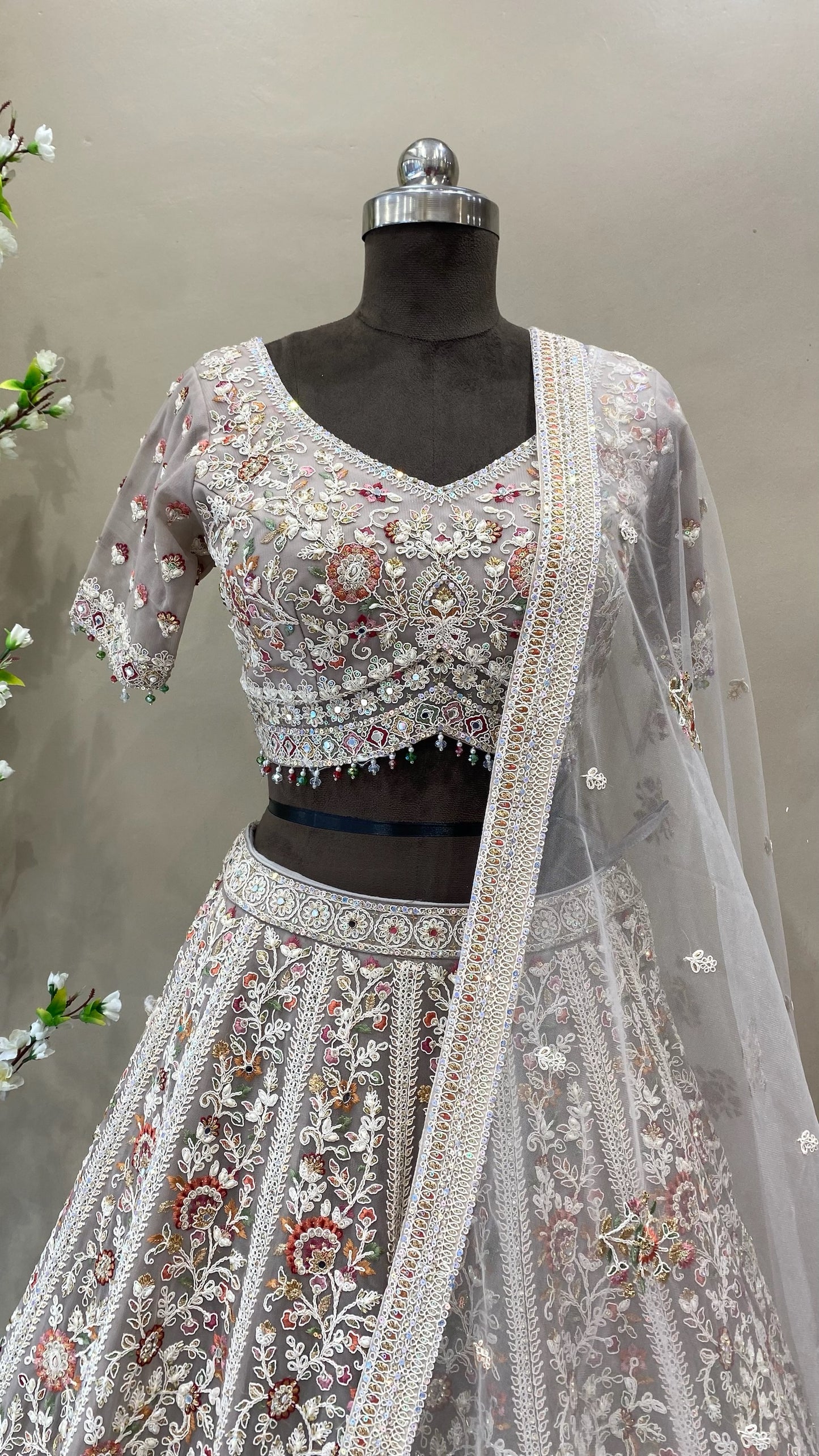 Engagement Wear lehenga design with multi thread work and zarkan highlights