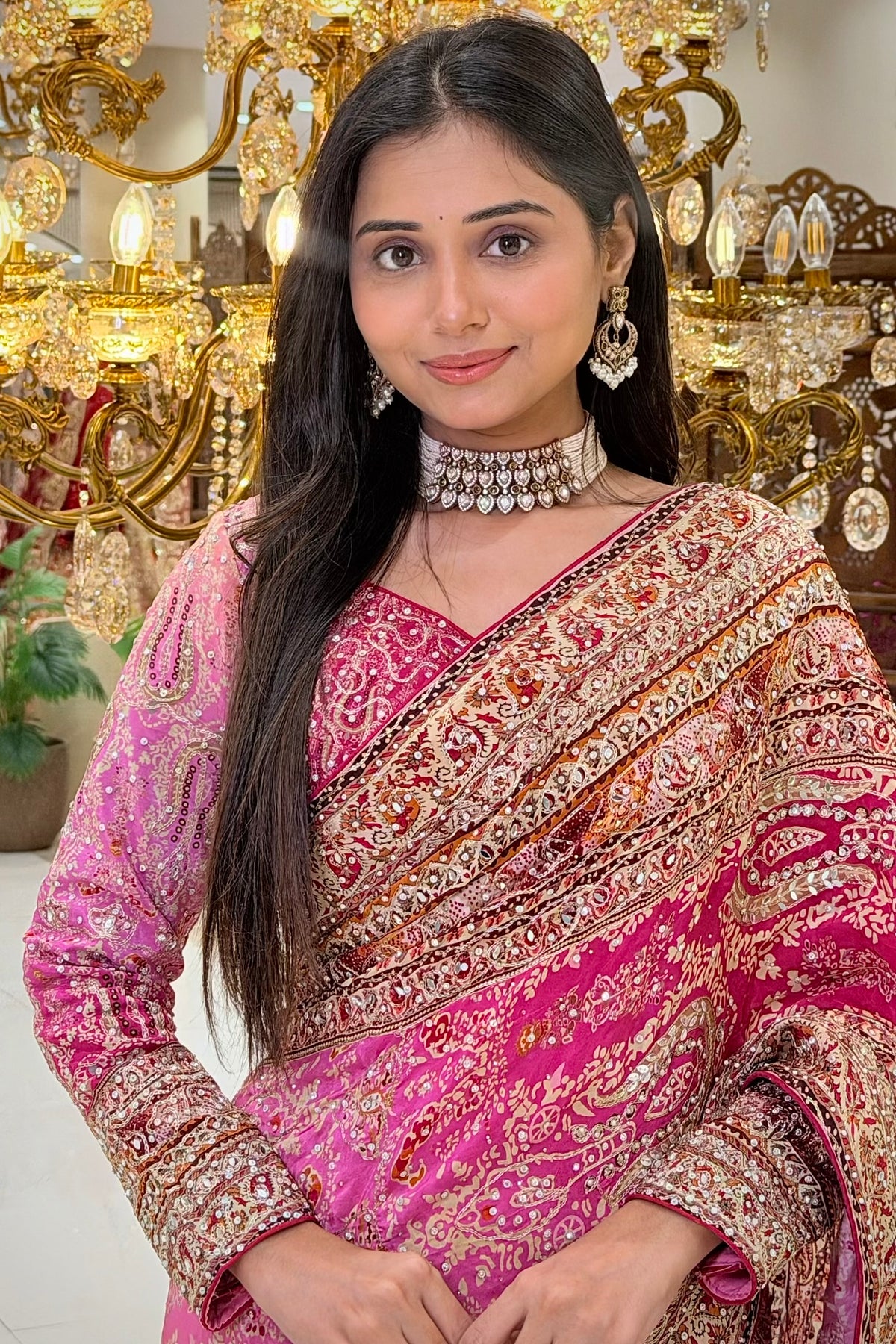 Close-up portrait of pink printed chinon saree with handwork blouse, bridal & occasion saree from Urban Dulhaniya Pune