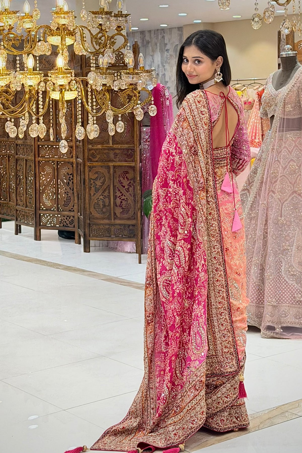Back view of pink printed chinon saree with handwork blouse, designer bridal wear at Urban Dulhaniya Pune