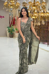 Back view of lace-up handwork blouse and olive green sequin saree, bridal & occasion saree from Urban Dulhaniya Pune