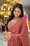 Close-up of red tissue saree with beads and cutdana work blouse, bridal & occasion saree from Urban Dulhaniya Pune