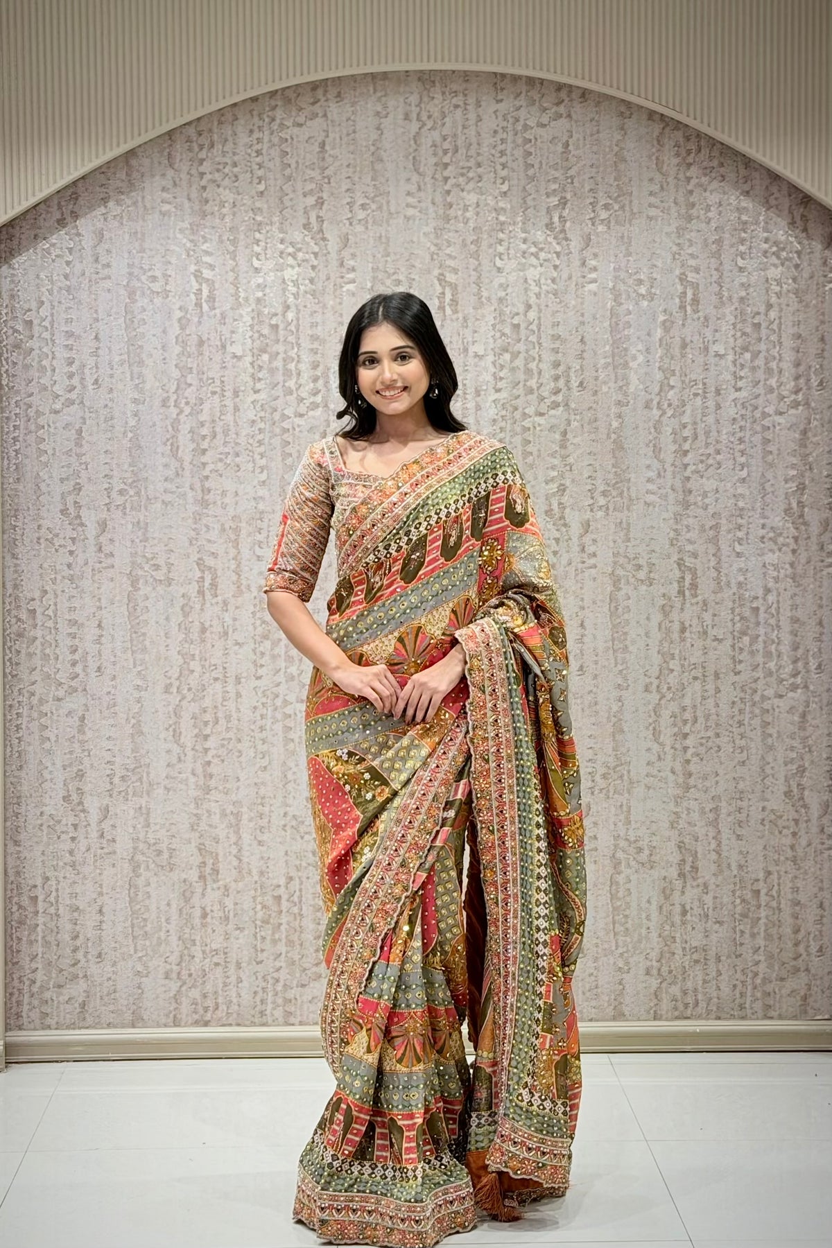 Full length front view of multicolor tissue saree with cutdana border, designer bridal wear at Urban Dulhaniya Pune