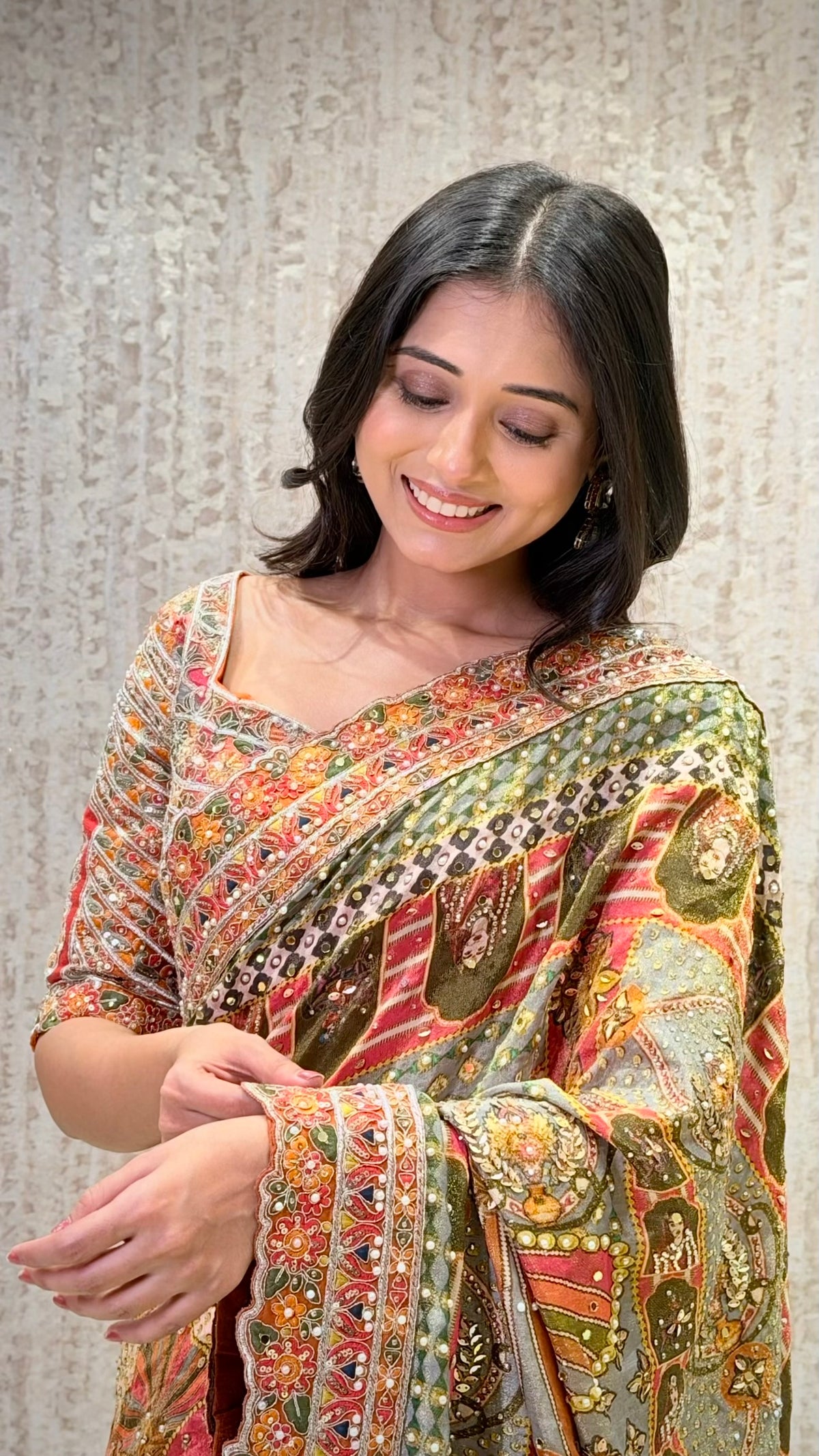 Close-up of multicolor tissue saree with beads and cutdana work, designer bridal wear at Urban Dulhaniya Pune