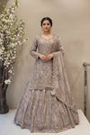 Luxury Dusty Rose long kurta lehenga set with heavy Zardosi embroidery for Indian bridal reception.