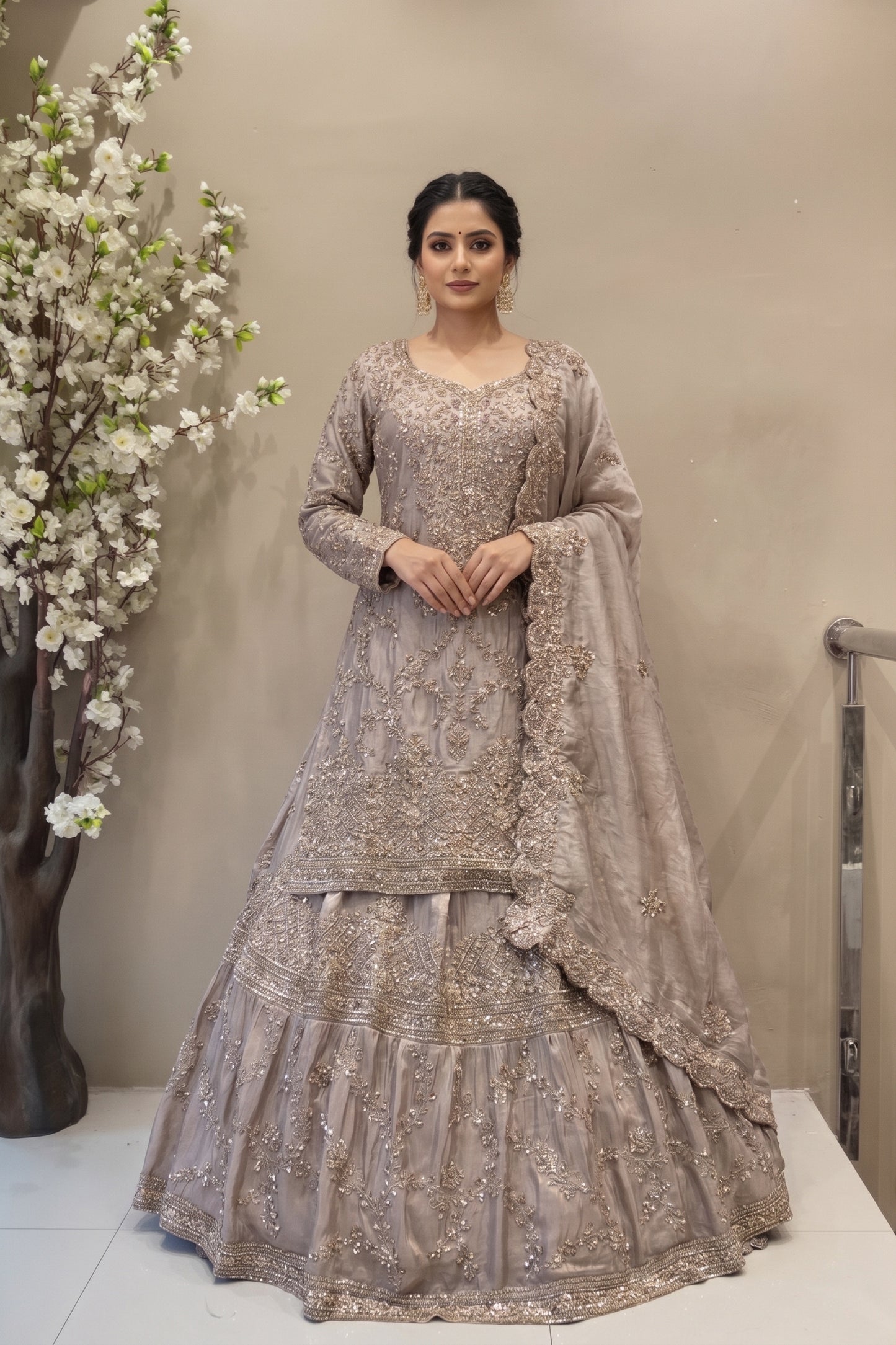 Luxury Dusty Rose long kurta lehenga set with heavy Zardosi embroidery for Indian bridal reception.