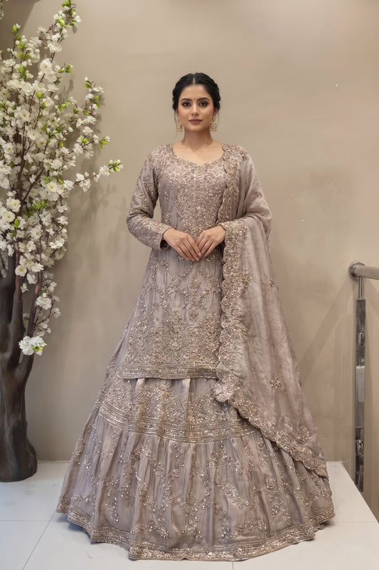 Luxury Dusty Rose long kurta lehenga set with heavy Zardosi embroidery for Indian bridal reception.