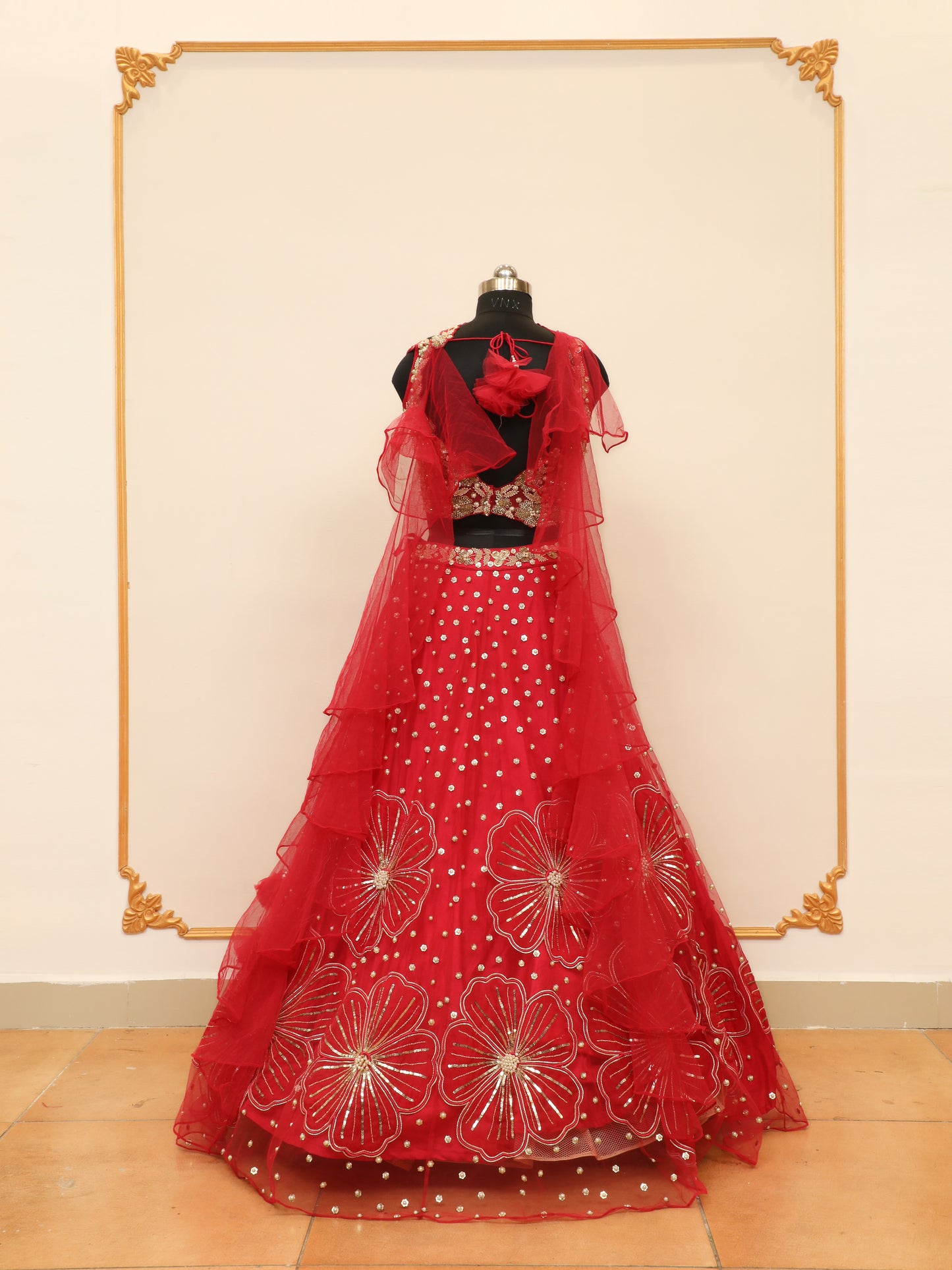 Rani Designer Lehenga for Bridesmaid with Designer cut blouse and lehenga with multiple big florals.