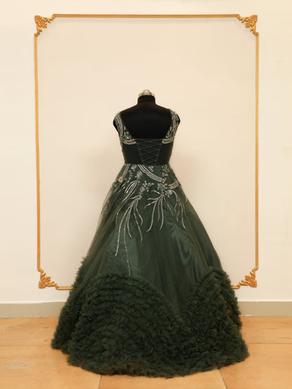 Reception Wear Ball Gown with Bottom Ruffle pattern and handwork embellishments which gives it a grand look