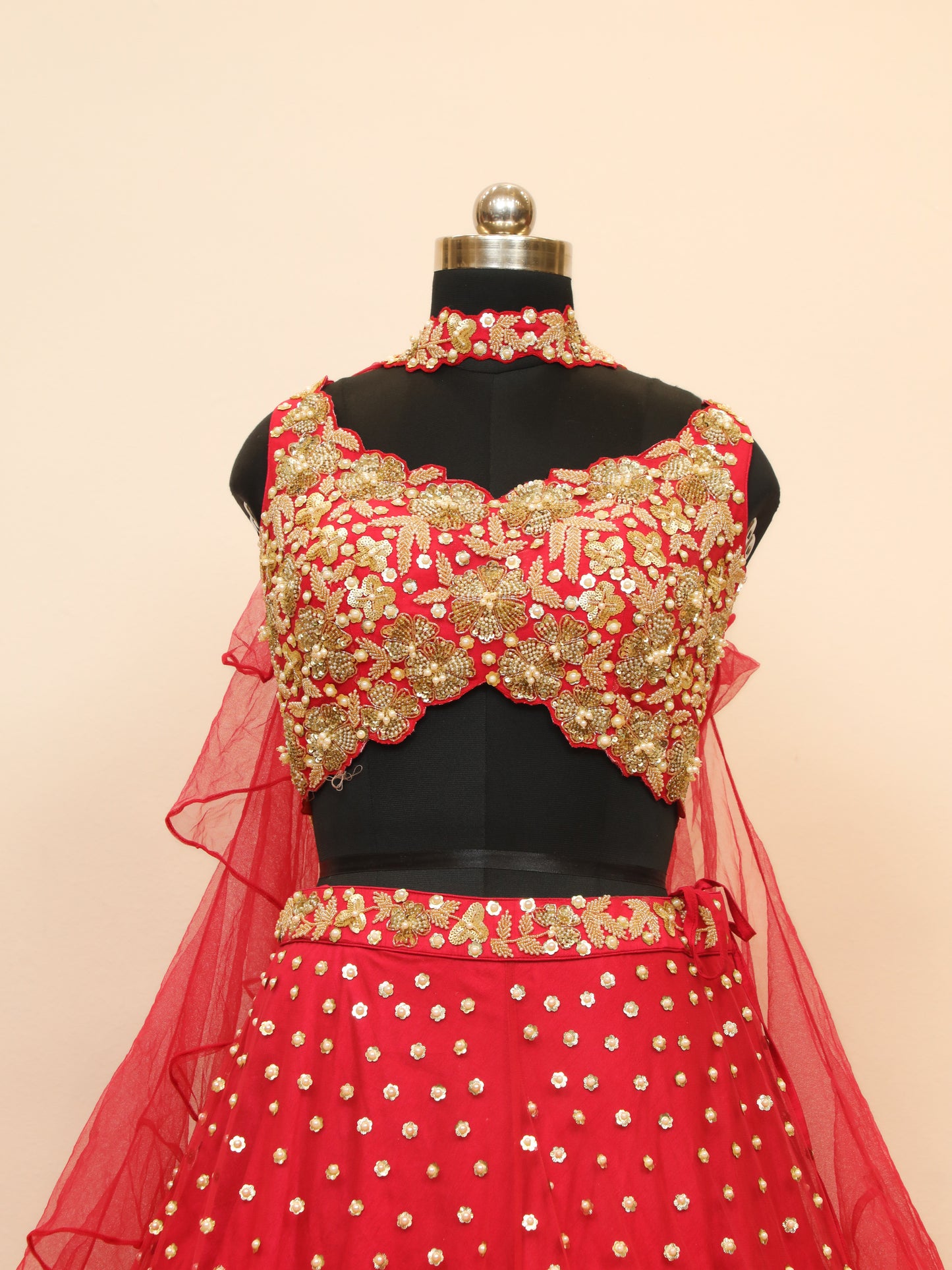 Rani Designer Lehenga for Bridesmaid with Designer cut blouse and lehenga with multiple big florals.