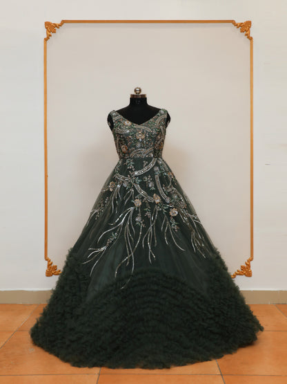 Reception Wear Ball Gown with Bottom Ruffle pattern and handwork embellishments which gives it a grand look